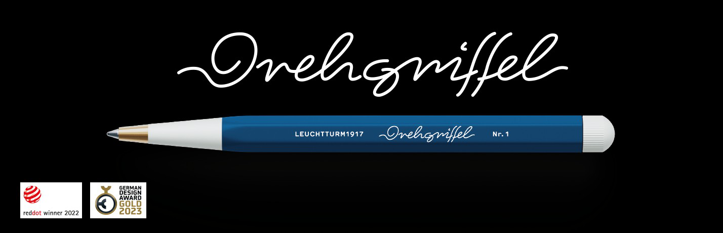 Drehgriffel Nr.1 Designgewinner. Blue-and-white Drehgriffel No. 1 with gold tip on black background, “Drehgriffel”, 2 awards.